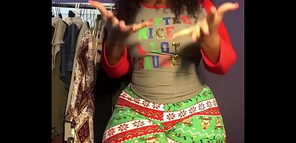  Cherokee D Ass stretching in Christmas leggings
